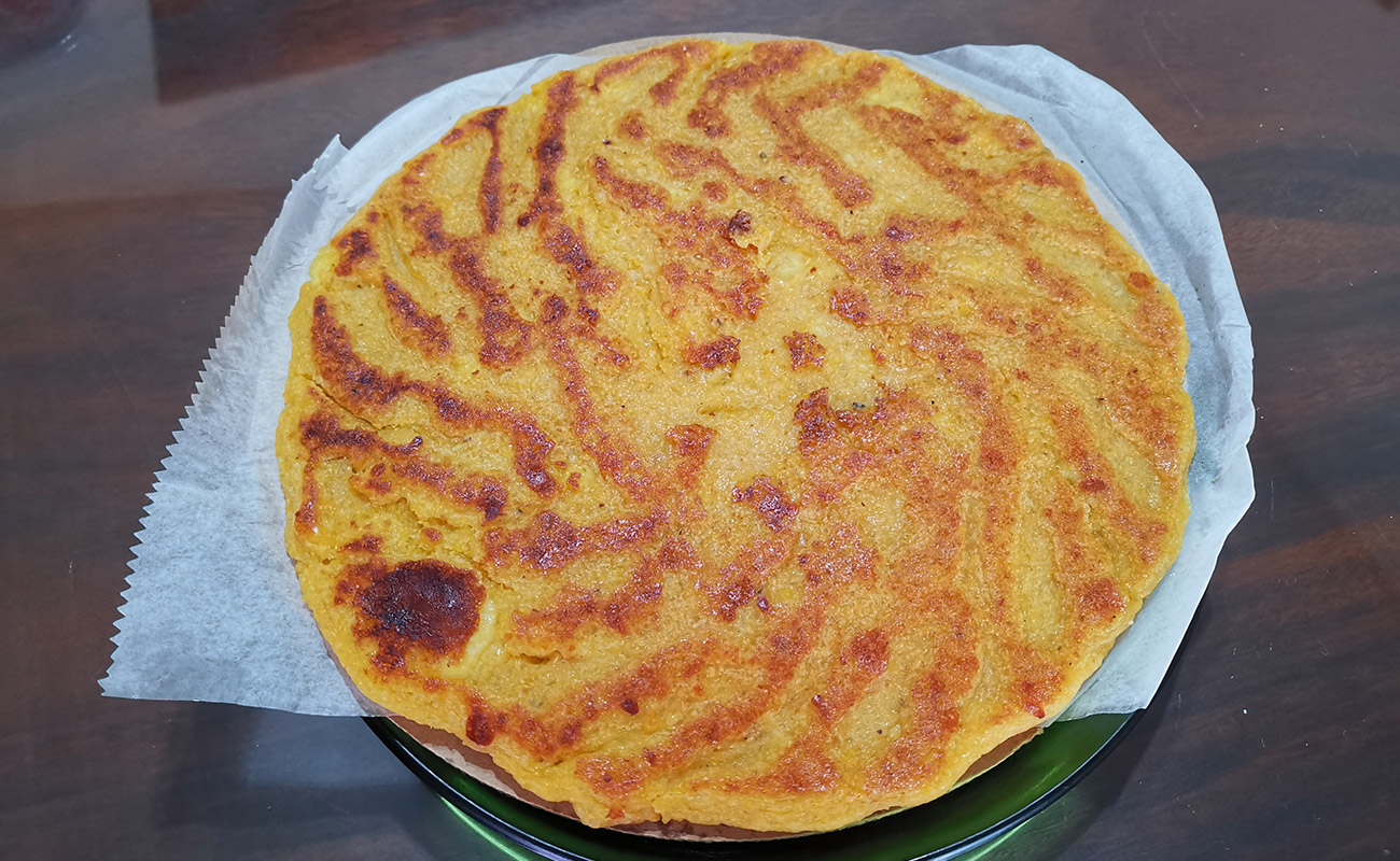 Tortilla maíz alineada con Queso 1unidad / Comida Criolla la Rustica, Mercado Municipal, Heredia-11082023